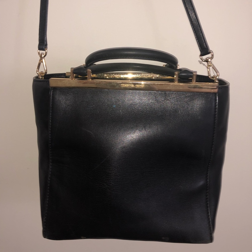 Black and gold Michael Kors hand bag